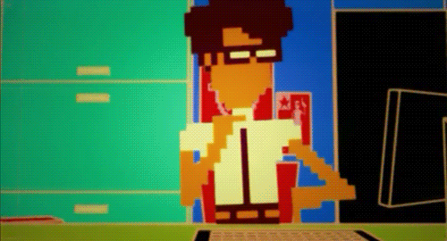 imagem animada em estilo pixel art do personagem Moss, da série The IT Crowd , sentado à uma mesa utilizando um computador.